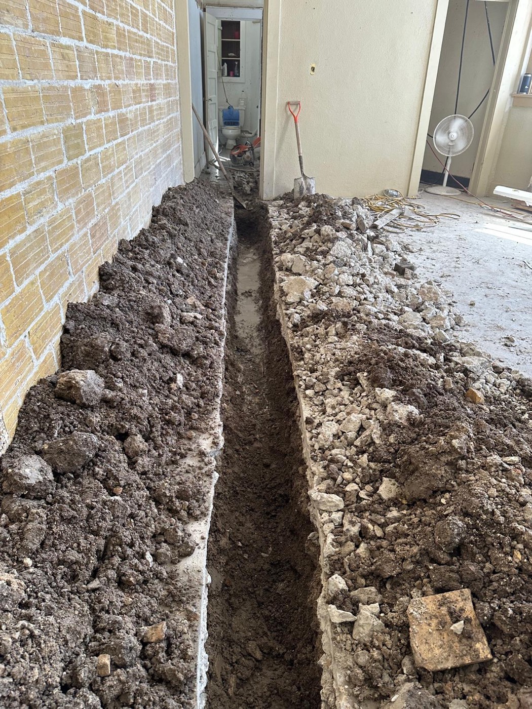 Housing rehab - utility trench