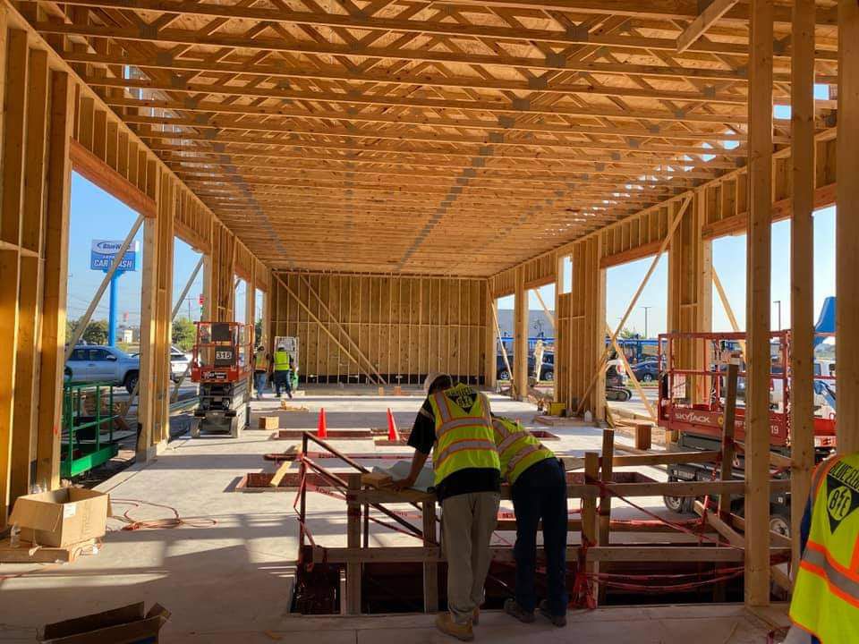 Site supervisor with crew