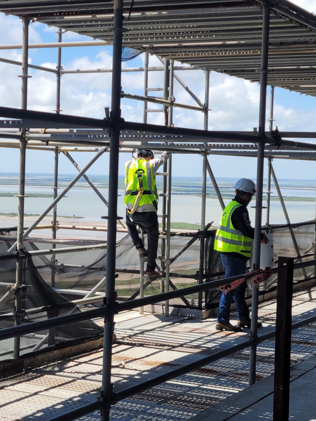 Scaffolding crew with bay view