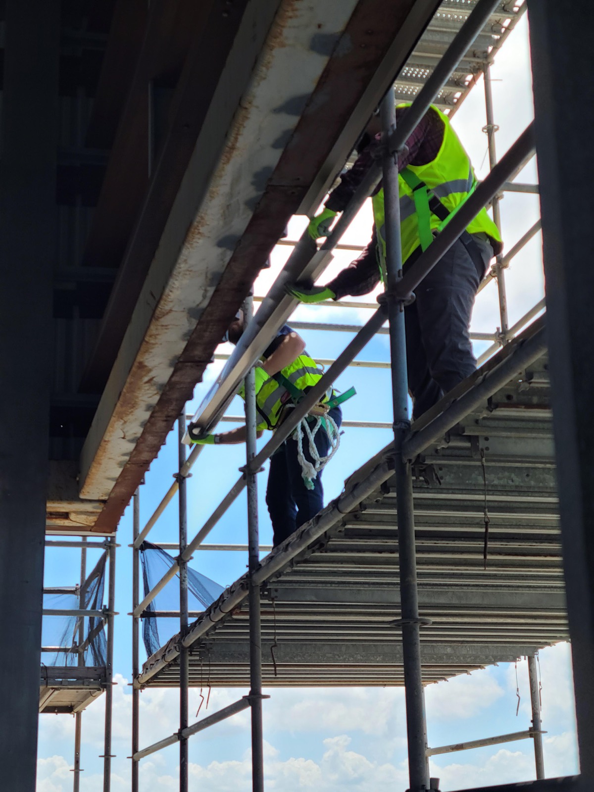 Steel panel install crew